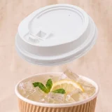 12oz-white-reclosable-sip-through-lid-for-paper-cups-in-use